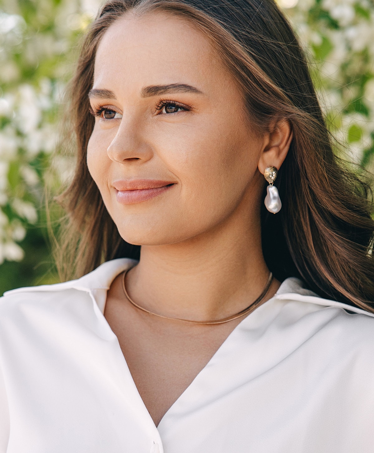 Model in blue activewear striking a pose.