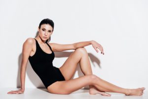 Side View Full Length Of Beautiful Woman In Black Swimsuit 300x200